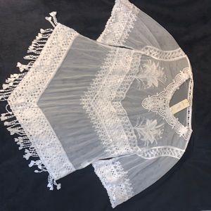 Sheer bathing cover up, color white, and size small